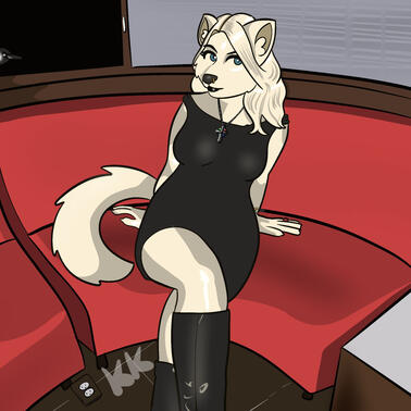 Wolf girl sitting on a red couch